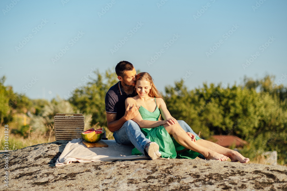 Cheap Vacations for Couples, Candid couple in love holding hands on nature background.