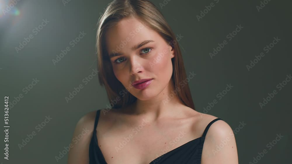 Beautiful fashion model young girl with perfect natural makeup posing in studio. Skincare cosmetics ad. ProRes Beautiful fashion model young girl with perfect natural makeup posing in studio. Skincare cosmetics ad. ProRes