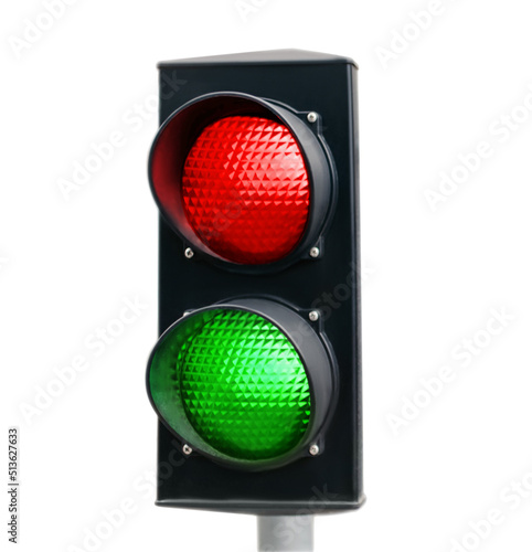 Traffic light with red and green signals on white background