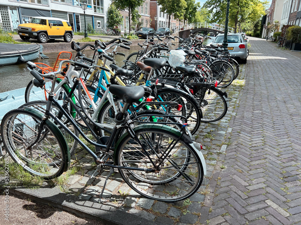 Parking with different bicycles on city street