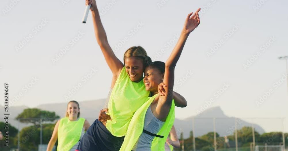 Young hockey player scoring a goal and celebrating with her teammates. Girls hockey team winning match after scoring a penalty during a game. Cheering, showing happiness and joy and enjoying victory Young hockey player scoring a goal and celebrating with her teammates. Girls hockey team winning match after scoring a penalty during a game. Cheering, showing happiness and joy and enjoying victory