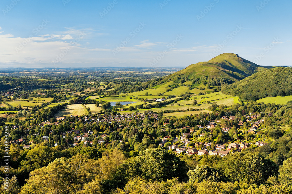 North from Ragleth Hill over Church Stretton village, Shropshire, England. Watling Street Roman Road and Caer Caradoc hill fort
