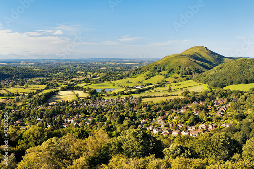 Obraz na płótnie North from Ragleth Hill over Church Stretton village, Shropshire, England. Watling Street Roman Road and Caer Caradoc hill fort w salonie