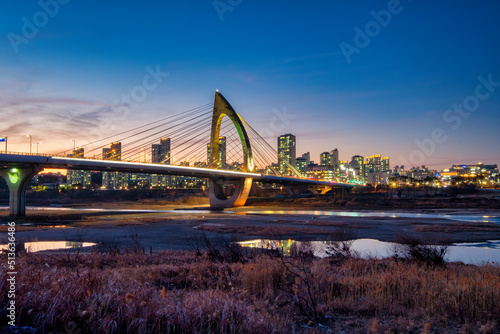 Scenic views of bridge and river against sky during sunset