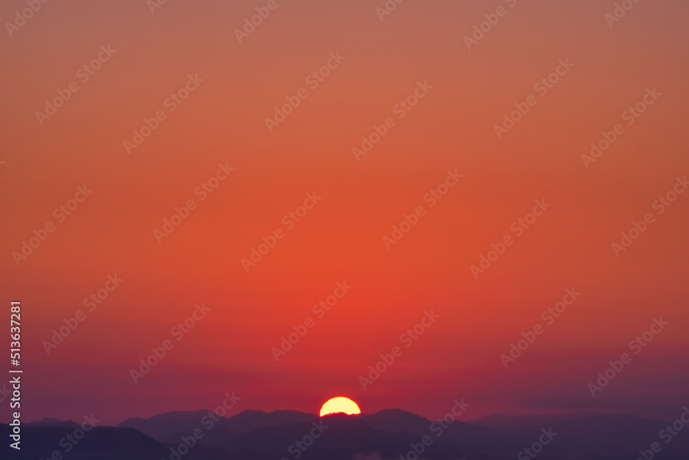Obraz premium Scenic view of mountains against sky during sunrise