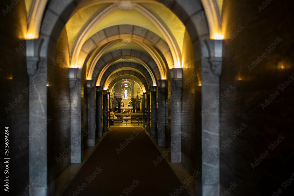Hall way inside of Our Lady of Lourdes Sanctuary in France 