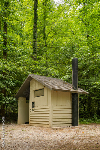 Rustic Outhouse Bathroom in the Forest 