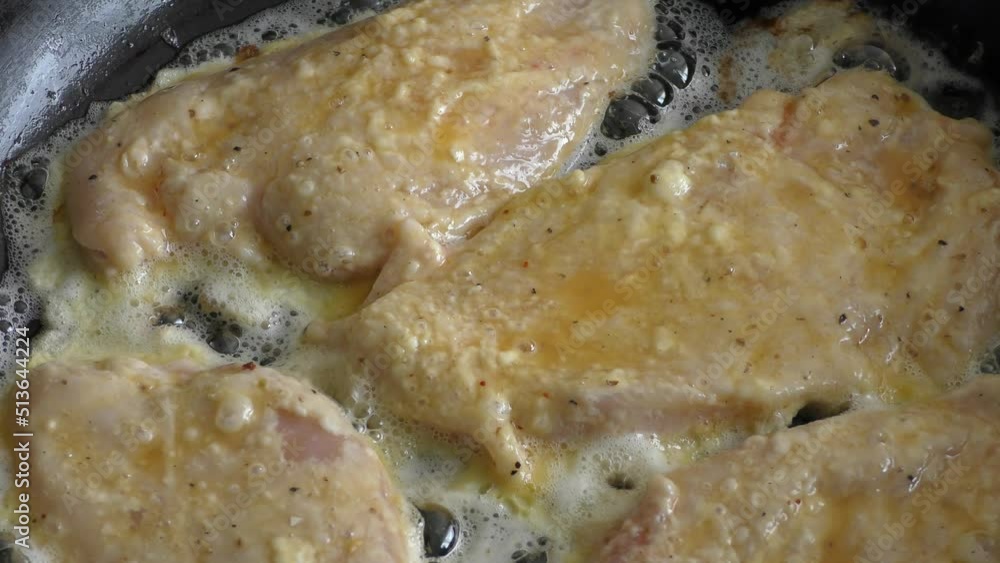 chicken chops frying in a pan chicken chops frying in a pan