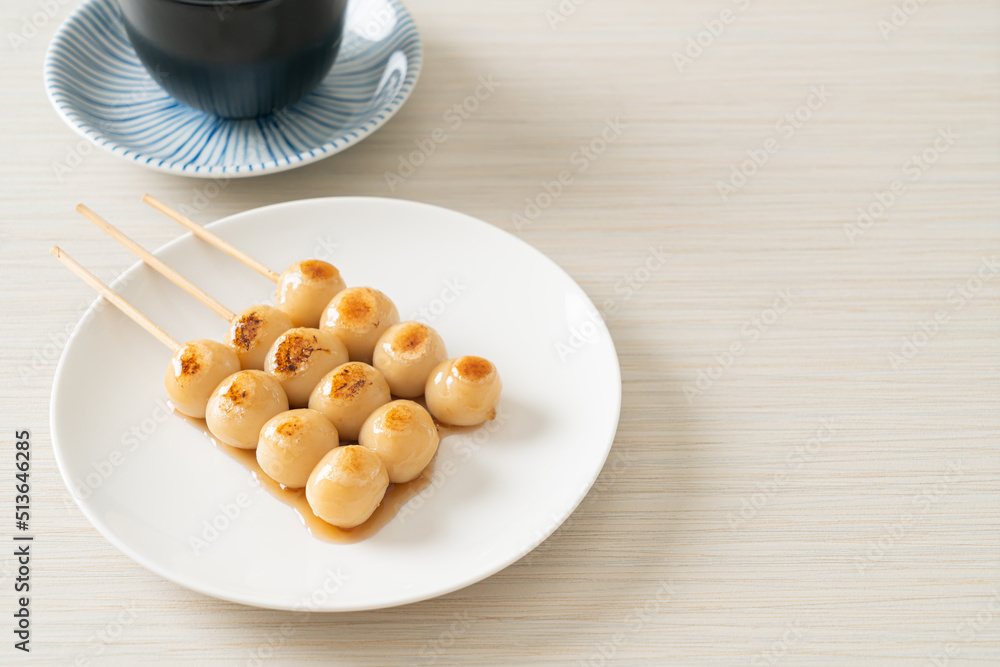 Mitarashi dango. Dumpling in a sweet soy sauce Mitarashi dango. Dumpling in a sweet soy sauce