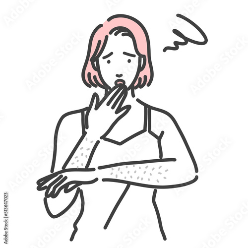 腕のムダ毛に悩んでいる若い女性
