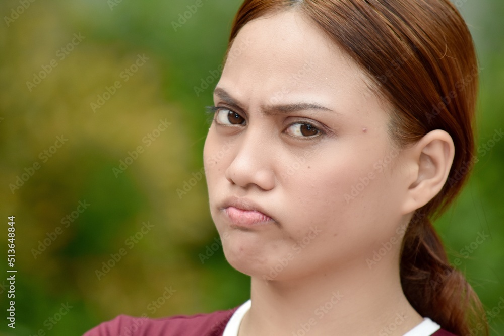 Unhappy Attractive Asian Female Wearing Tshirt Unhappy Attractive Asian Female Wearing Tshirt