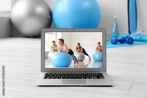 Modern laptop on floor. Con...