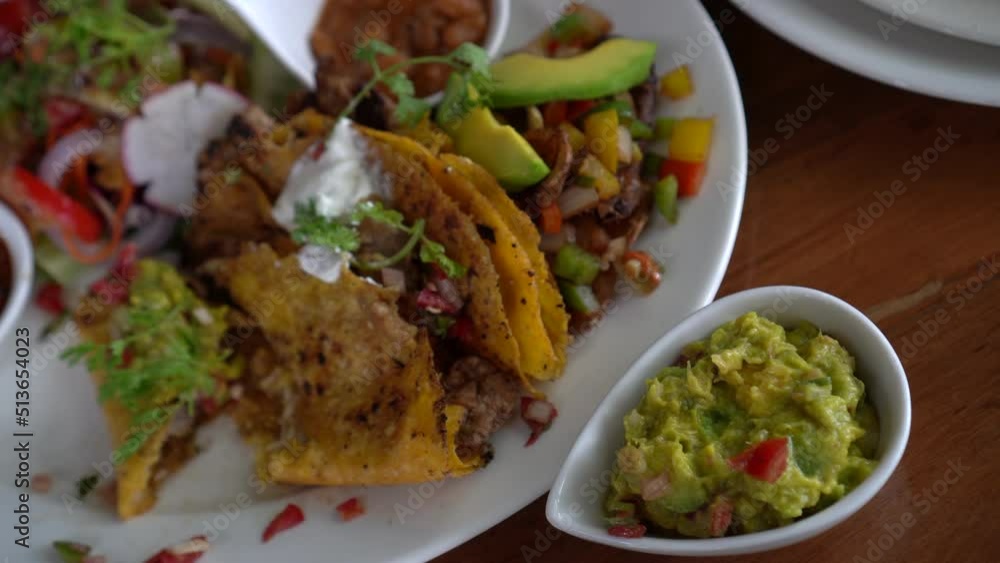 Mexican plates top view nacho beef salsa salad bean and avocado guacamole healthy food Mexican plates top view nacho beef salsa salad bean and avocado guacamole healthy food
