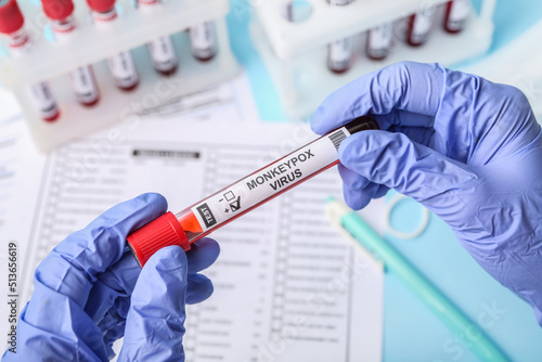 Female doctor with blood sa...