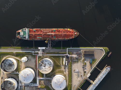 Obraz na plátně Petrochemical energy heavy transport industry cargo vessel tanker top down aerial drone view