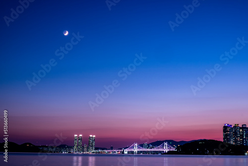 Scenic view of a harbor against sky during sunset photo