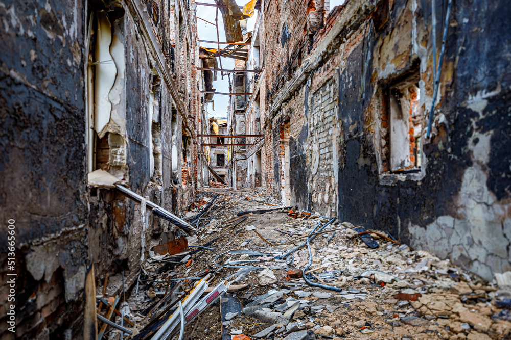 Corridor in an unknown building bombed by Russian troops. War in Ukraine