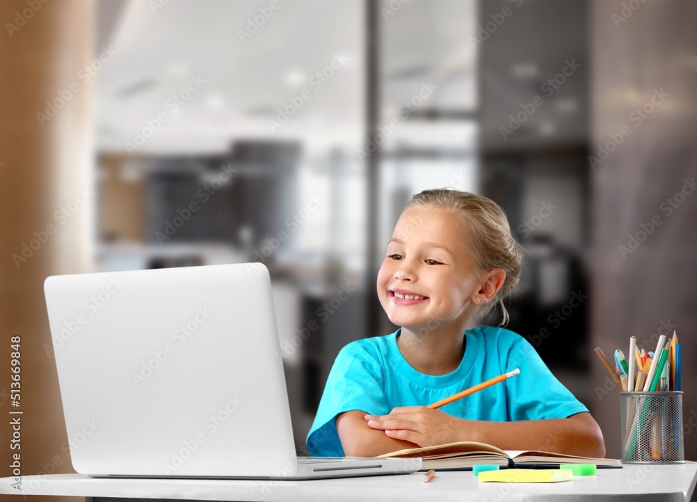 Portrait of smiling child studying at home, homeschooling concept Portrait of smiling child studying at home, homeschooling concept