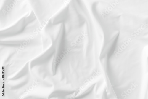 White fabric. luxurious white fabric texture background. Creases of satin, silk, and cotton.