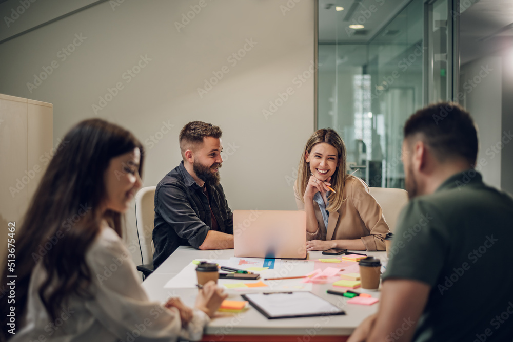 Group of business people having a meeting in the office Group of business people having a meeting in the office