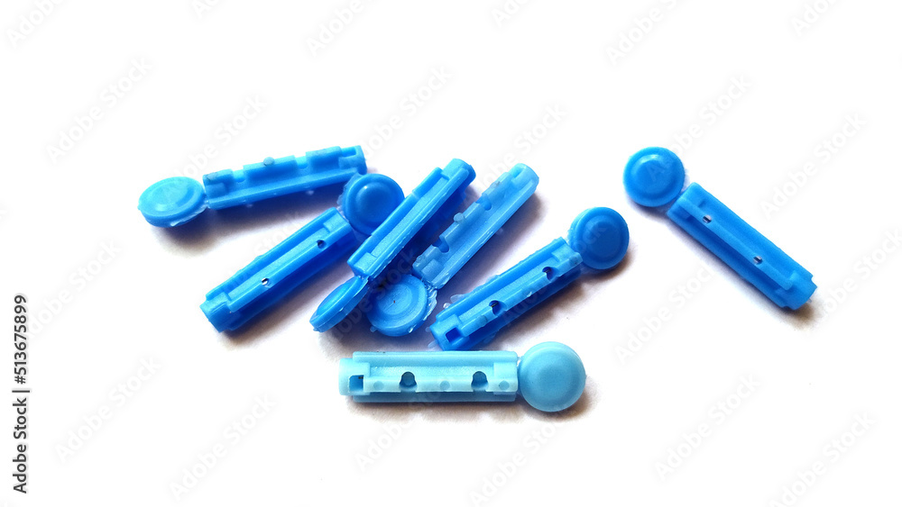 Naklejka premium Blood Lancet image,Lancet Needles for Diabetes Finger on white background