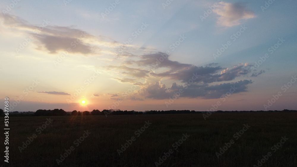 Sunset over water meadows near the village of Agro-Pustyn