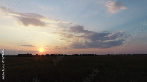 Sunset over water meadows near the village of Agro-Pustyn