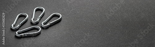 Canvas Print 4mm climbing carabiner isolated against a dark background