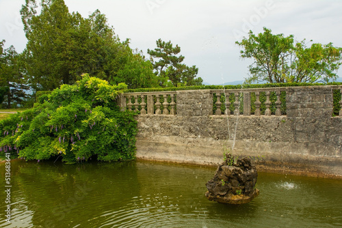 The pond in the Ferrari Garden in Stanjel village in Komen municipality, Primorska region, western Slovenia
 photo