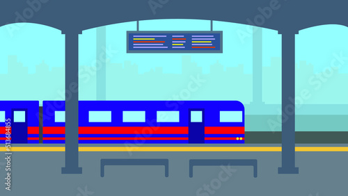 Train on the platform at the railway station