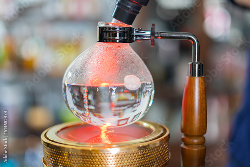Making coffee with syphon method
