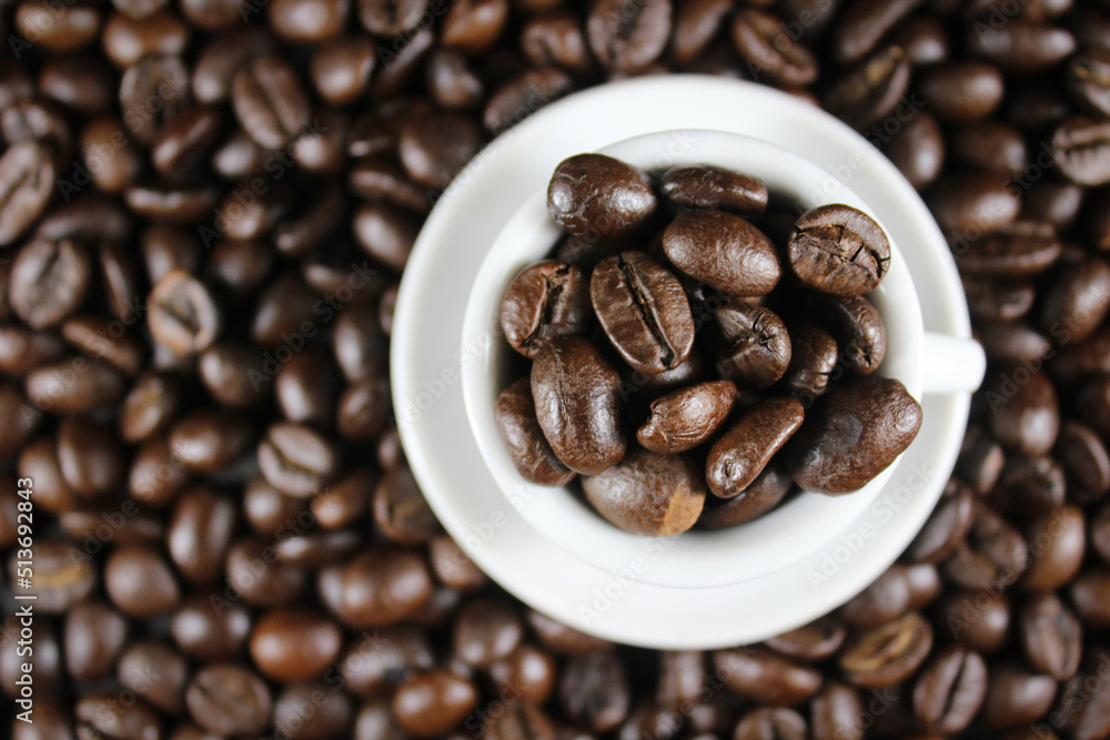 Coffee bean in a cup wallpaper Coffee bean in a cup wallpaper