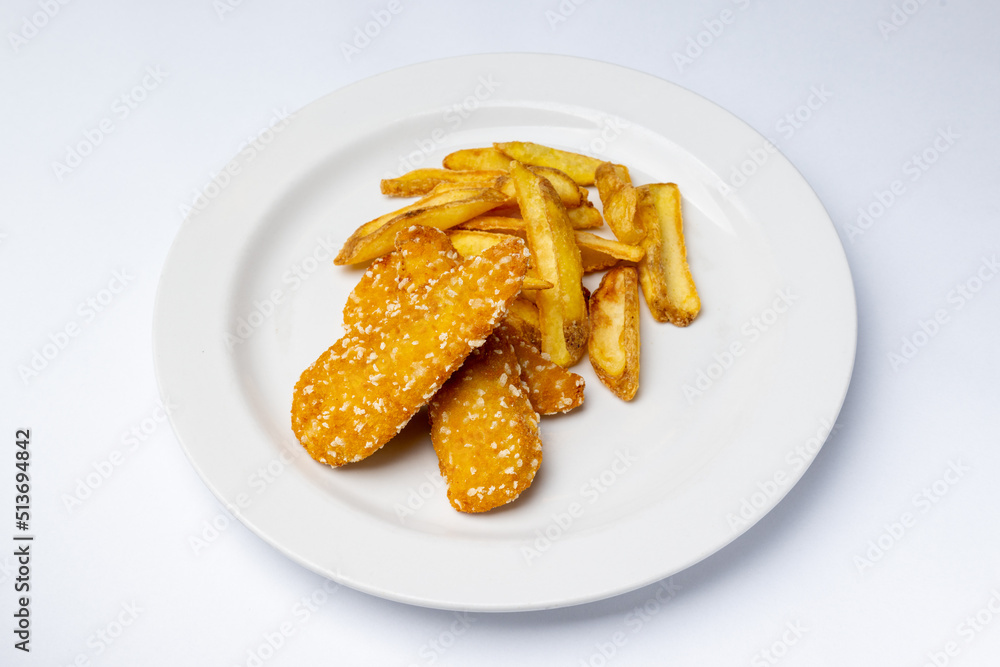 Fried chicken strips with home fries Fried chicken strips with home fries