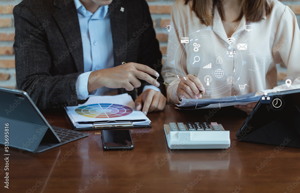 Fototapeta premium Business partners working on table office, business planning and technology development interface connection concept. 