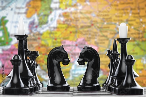 Wooden chess figures on a classic chessboard