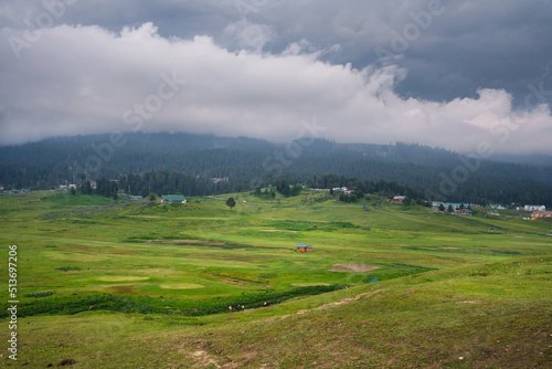 Gulmarg, known as Gulmarag in Kashmiri, is a town, hill station, popular skiing destination, and notified area committee in the Baramulla district of Jammu and Kashmir, India. photo