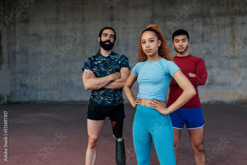 Group of athletes posing in urban area