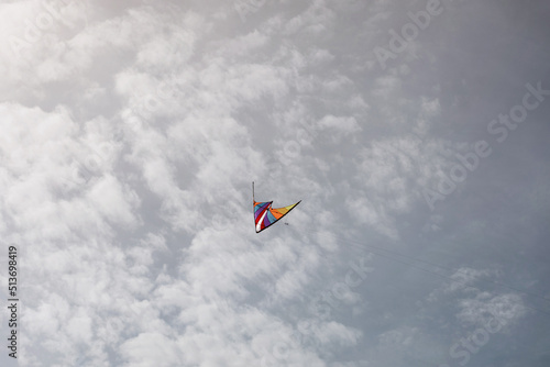  colorful kite flying with waving in sky