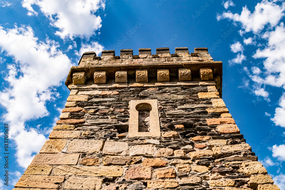 Medieval castle tower in the German historical town of Saarburg. Ancient castle against the blue sky. Tourist attractions in Germany. Medieval castle tower in the German historical town of Saarburg. Ancient castle against the blue sky. Tourist attractions in Germany.