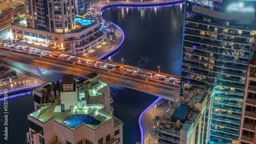 Dubai Marina waterfront and city promenade night timelapse from above. © neiezhmakov