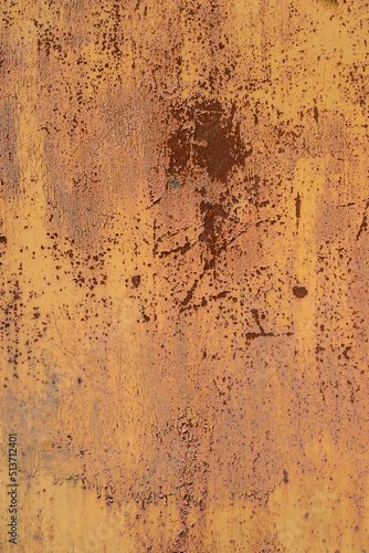 Old rusty and battered metal background