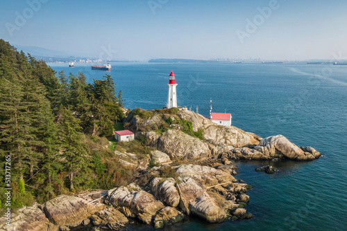Aerial view of historic landmark Point Atkinson Lighthouse in West Vancouver, British Columbia, Canada. photo