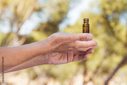 woman testing aromatherpy oils on a summertime mindfulness ritual.