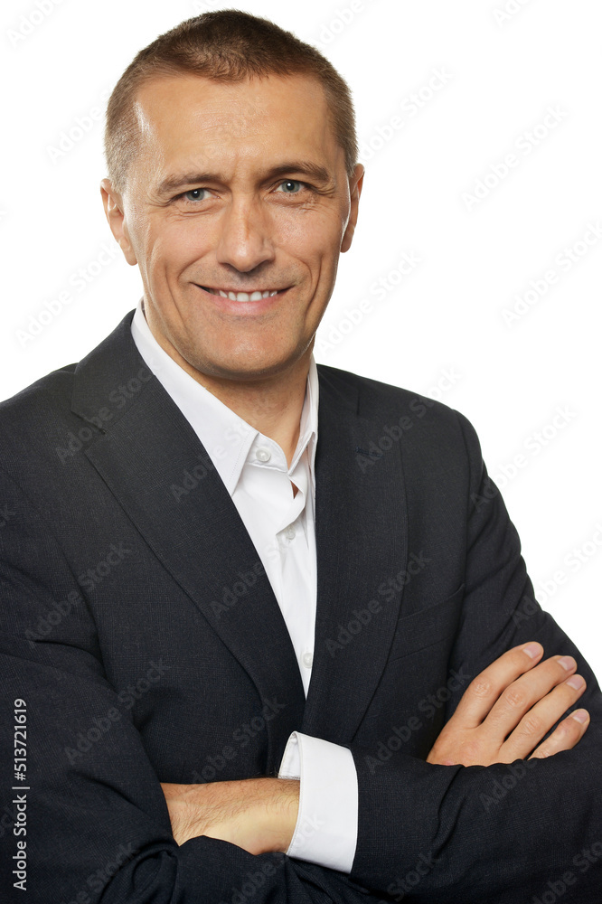 Portrait of a businessman wearing formal suit posing isolated Portrait of a businessman wearing formal suit posing isolated