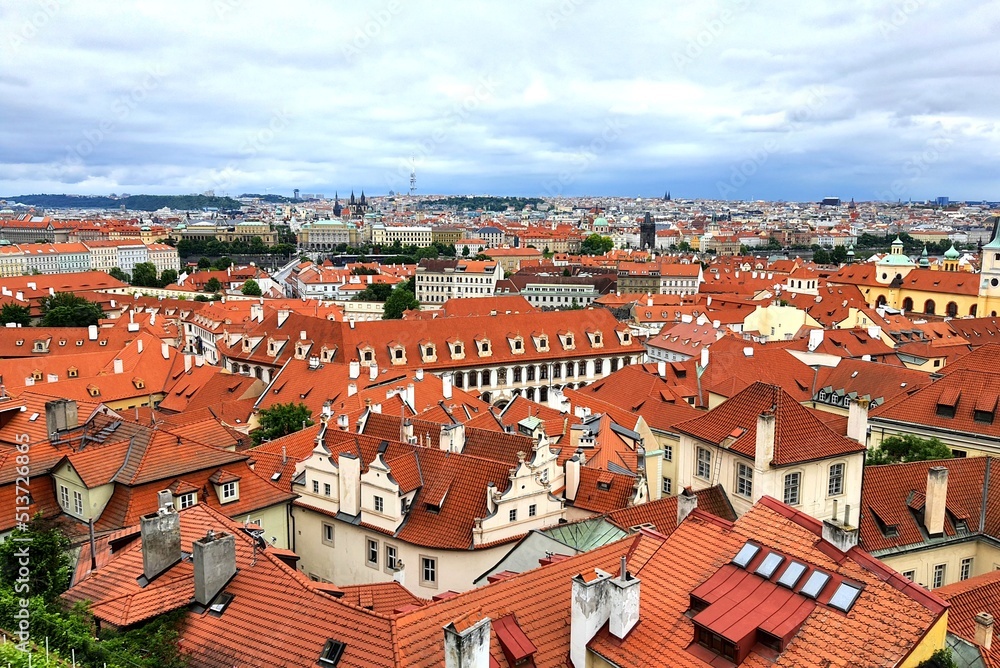 Prague, Czech Republic. Mala Strana, Lesser Town of Prague. Top view , downtown, panorama. Ancient old buildings with red tiled roofs, church, tower, castle