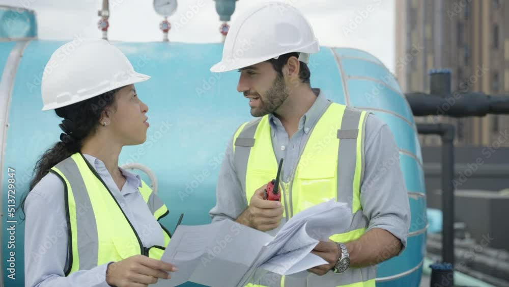 Technician working and inspecting the pipeline in factory Technician working and inspecting the pipeline in factory