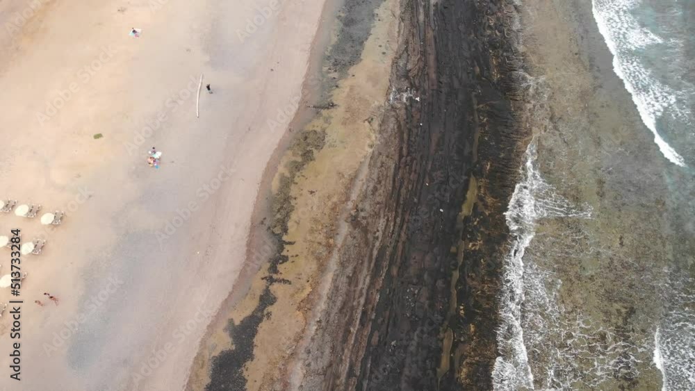 Aerial view on Las Americas volcanic sand beach. Summer time. Tropical island coastline. Aerial view on Las Americas volcanic sand beach. Summer time. Tropical island coastline.