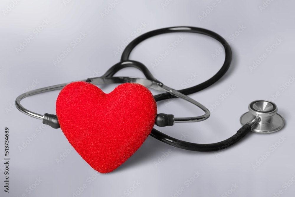 Red heart with medical stethoscope, heart health, health insurance concept, World heart day. Red heart with medical stethoscope, heart health, health insurance concept, World heart day.