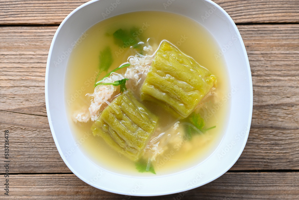 Stuffed bitter gourd with seasoned minced pork soup , Menu healthy food clear soup bowl with bitter gourd or bitter melon soup Stuffed bitter gourd with seasoned minced pork soup , Menu healthy food clear soup bowl with bitter gourd or bitter melon soup