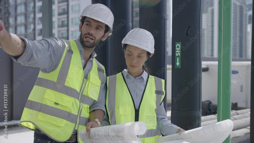 Technician working and inspecting the pipeline in factory Technician working and inspecting the pipeline in factory